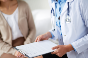 Person that suffered a birth injury is speaking with her doctor