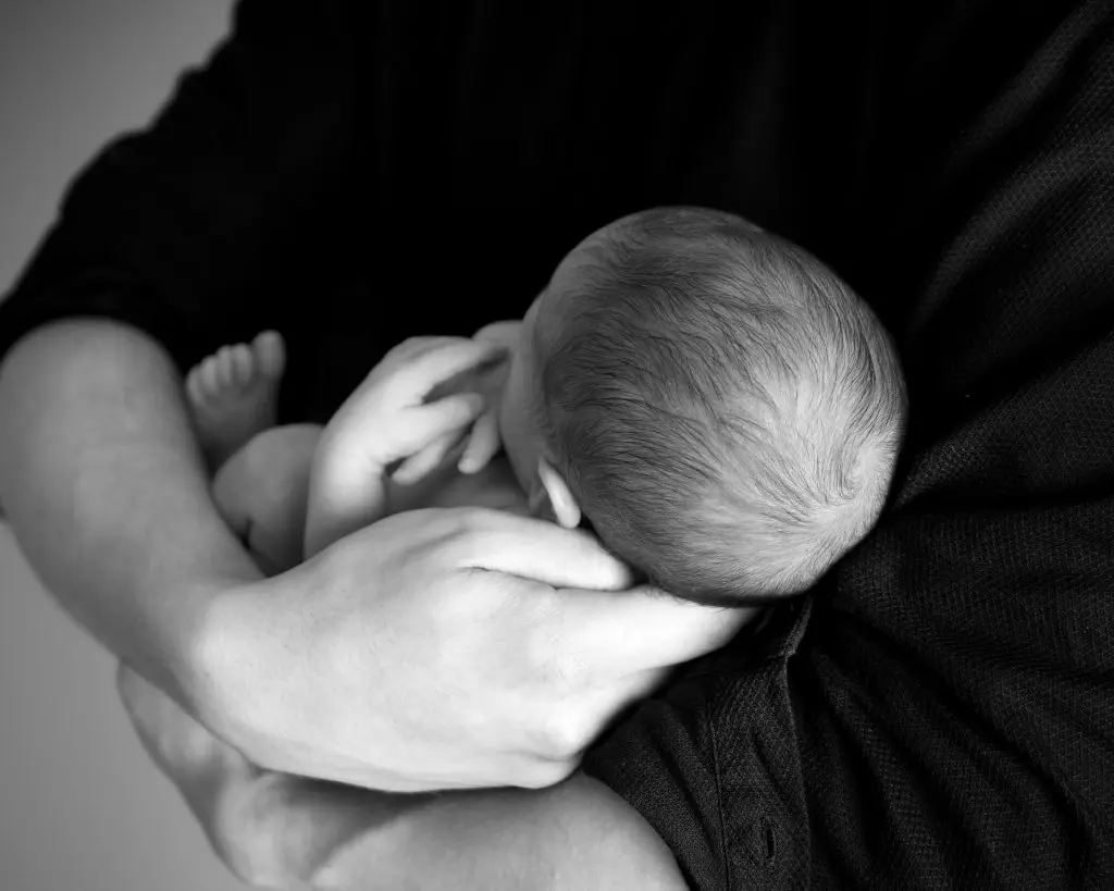 Father holding his baby