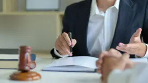 A Pittsburgh bicycle accident lawyer giving advice to a client