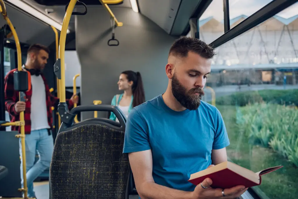 Man riding on a bus in Pittsburgh