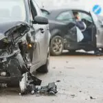 Scene of a severe car accident causing significant vehicle damage, frequently leading to brain injuries. Munley Law’s brain injury attorneys in Philadelphia, PA help victims secure fair compensation after motor vehicle accidents. For legal help, contact Munley Law at 215-515-7747.