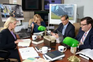 A team of truck accident lawyers working on a trucking case