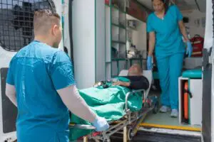 Pennsylvania semi truck accident victim being put into ambulance