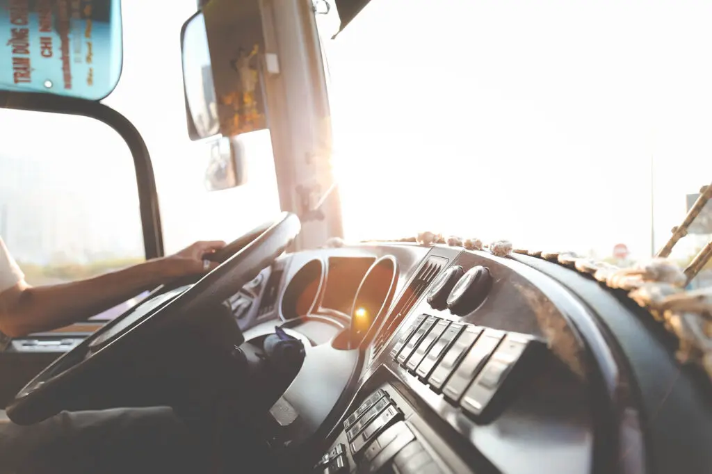 truck driver driving a tractor trailer