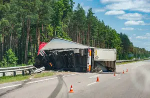 truck flipped on its side after a semi truck accident