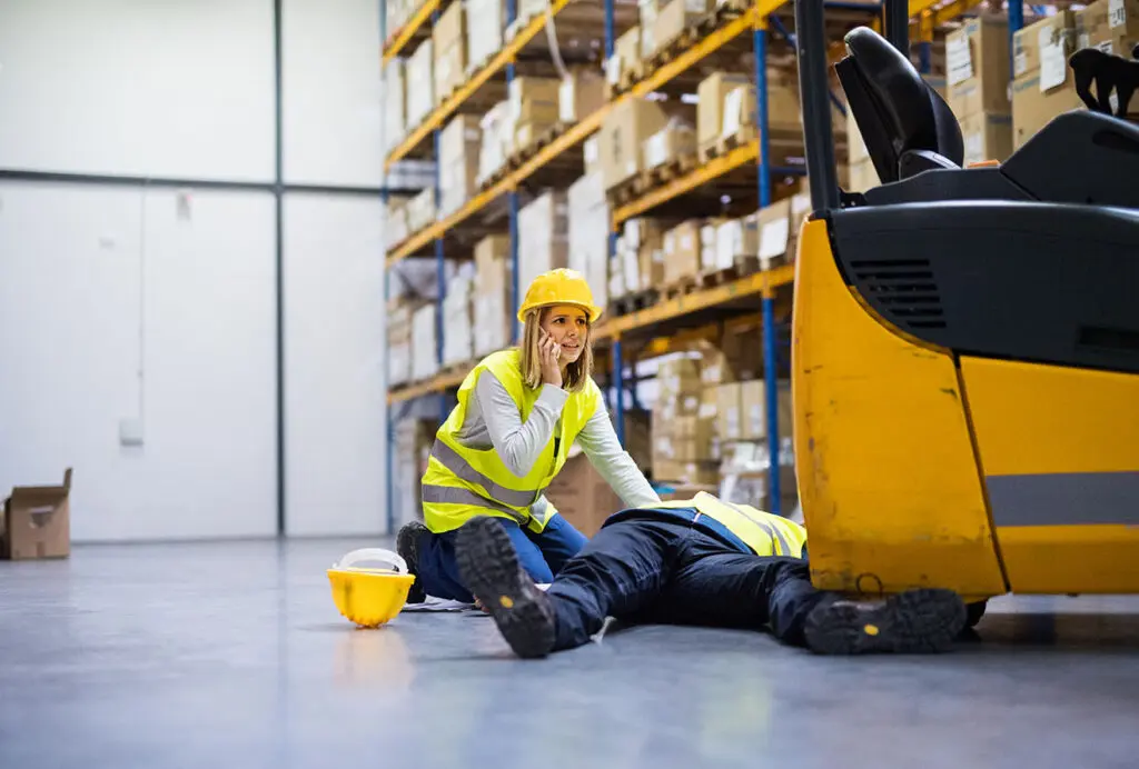 Warehouse workers after an accident in a warehouse.