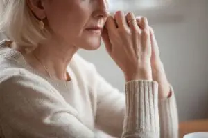 Munley Law in Allentown provides empathetic legal assistance and emotional support to families dealing with wrongful death claims. The image captures the thoughtful, reflective atmosphere Munley Law creates to support clients experiencing emotional and financial hardship after losing a loved one. Warm, diffused lighting and subtle elements illustrate compassion, trustworthiness, and reassurance from Munley Law's wrongful death attorneys in Allentown. Contact Munley Law at 855-866-5529 for compassionate legal guidance.