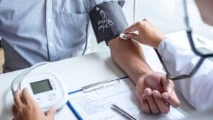 Doctor taking a patient's blood pressure