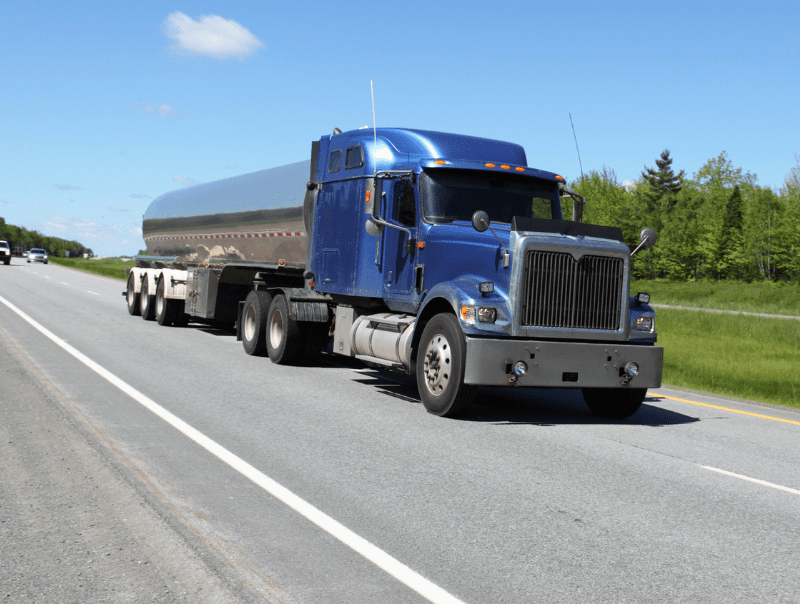 tanker truck speeding down the road