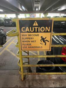 parking garage warning sign for slip and fall