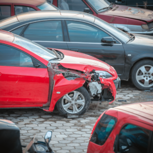 Car in parking lot with side impact crash damage