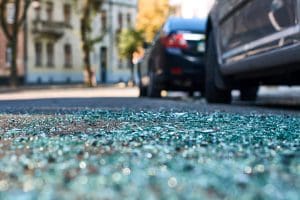 Broken glass at the scene of a recent auto accident in Philly