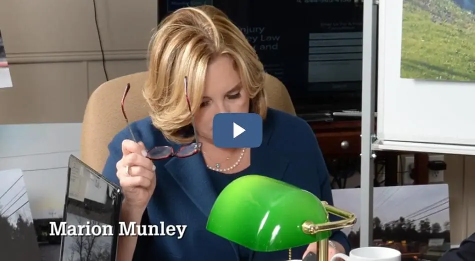 Truck accident attorney Marion Munley at Desk