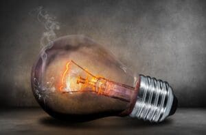 Light bulb with burning filament