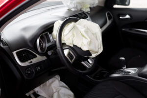 Car accident victim in need of product liability lawyer after airbag exploded during driving car.