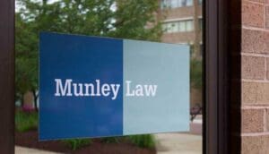 Munley Law sign on an office window