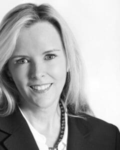 Munley Law Personal Injury Attorneys provide representation for Scranton workers' compensation cases. The image shows attorney Caroline Munley in a professional black-and-white portrait. She specializes in workers' compensation law in Scranton. Contact Munley Law at (570) 865-4699 to speak with an attorney about your compensation claim.