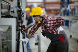 A warehouse worker in Allentown experiences significant back pain due to repetitive work duties, illustrating the need for workers' compensation benefits. Munley Law, an experienced workers' compensation attorney firm in Allentown, assists injured workers in securing medical and wage loss benefits. If you suffer from a workplace-related back injury, contact Munley Law at844-686-5397 for a free consultation about your workers' compensation claim in Allentown, Pennsylvania.