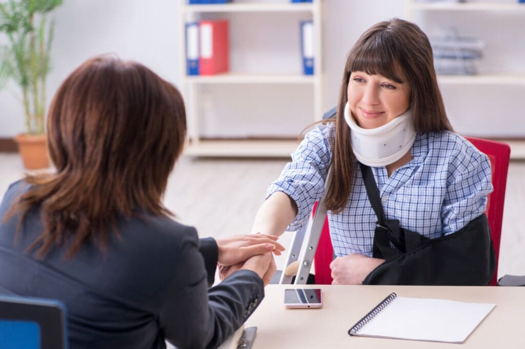 A Wilkes-Barre workers' compensation lawyer comforting an injured worker